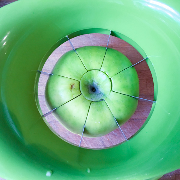 Coring and wedge cutting apples for a Waldorf Salad